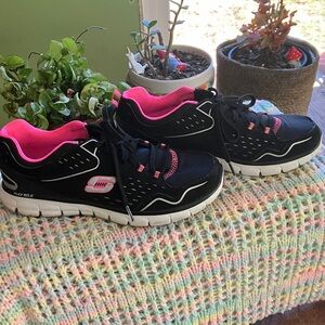 Skechers women’s Black and Pink Flex Sole Sneakers
